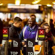 male customer service rep at gates in station