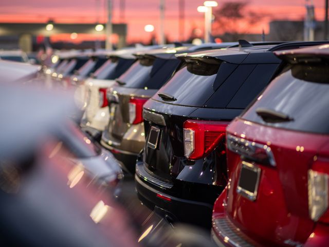 SUVs in car park