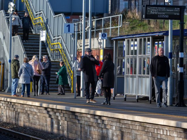 Passengers on platform in Warrington