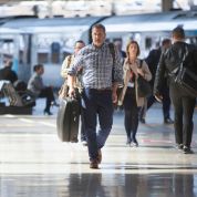 Commuters walking on platform at Newcastle station