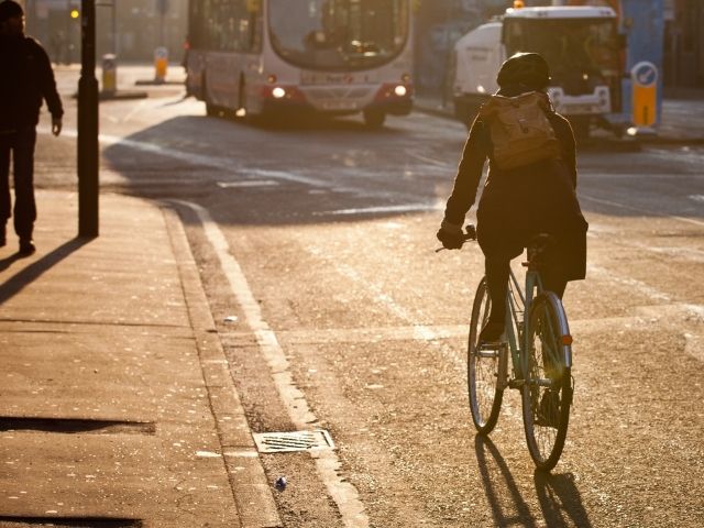 Cyclist on the road in Manchester