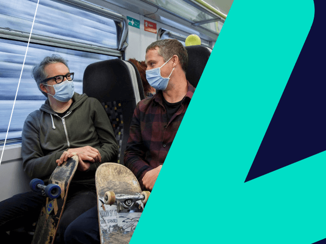 males on train with masks on